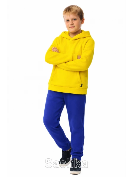 Трикотажний костюм на флісі жовтий з синіми штанами для хлопчика